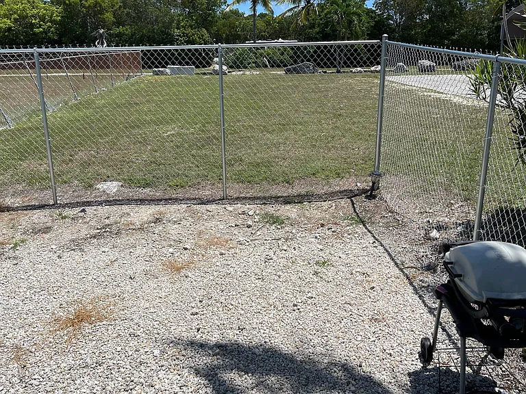Fenced pet relief area