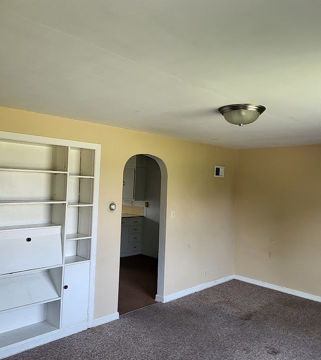 Living Room, Built in shelving, arched doorway