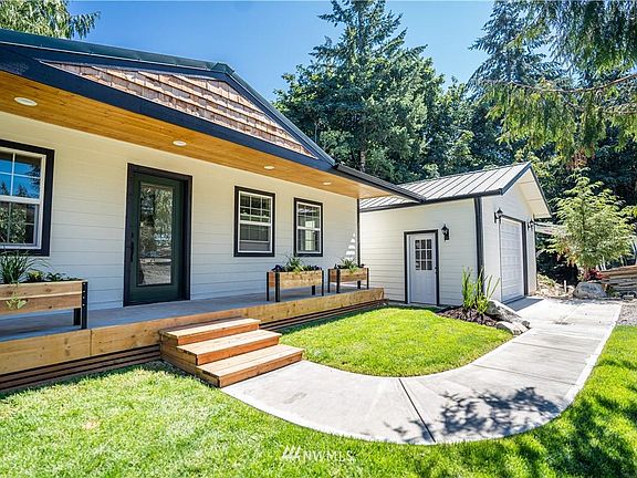 3rd image of 9848 Windward Dr NW