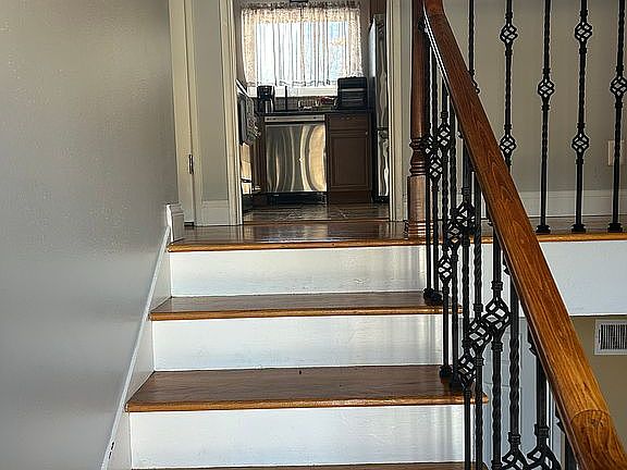 Stairs to upper level.