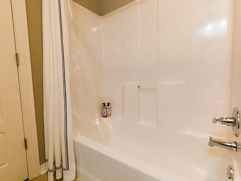 Tub - shower, full bath upstairs