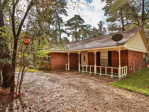 Inviting porch area awaiting for you to bring your chairs to sit outside and enjoy the view.