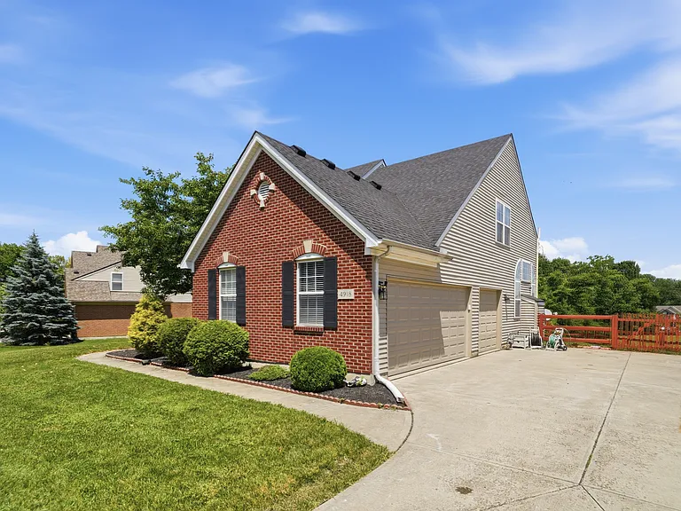 3 Car Garage and extended Drive way