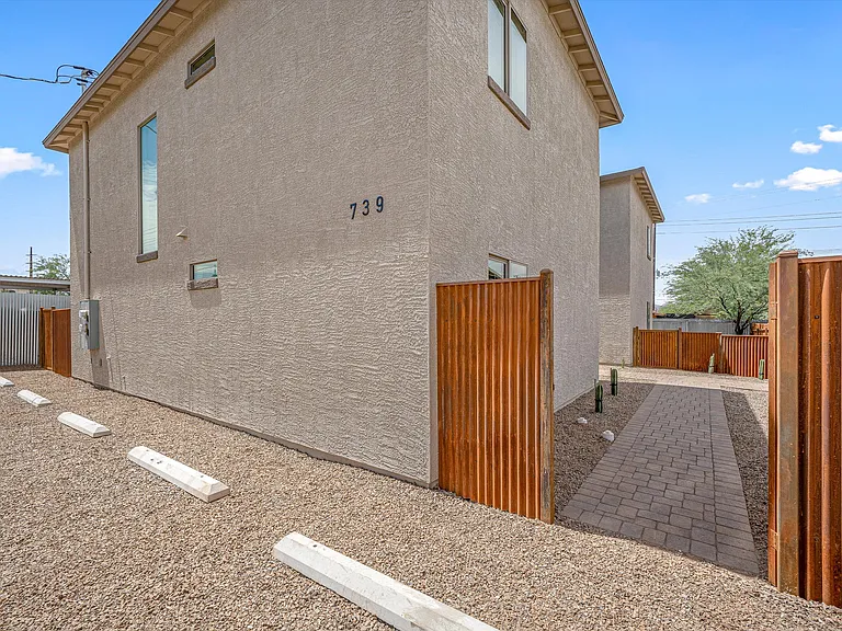Parking Area with walkway to front door