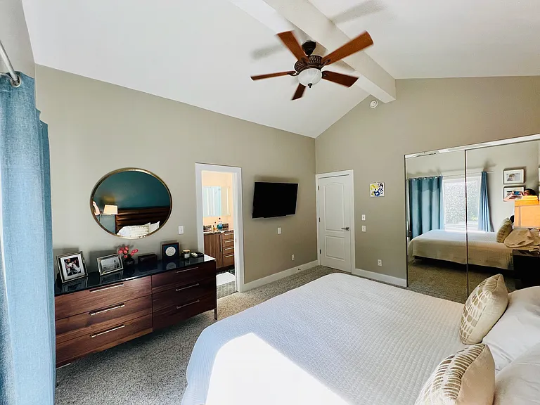 Another view of the primary bedroom.