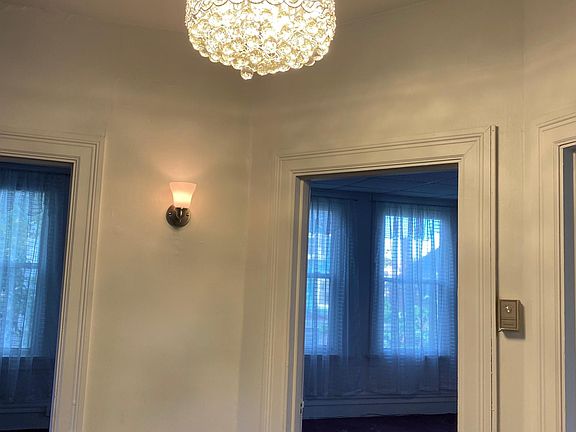 Crystal Fandelier (retractable blades) in apartment entrance
