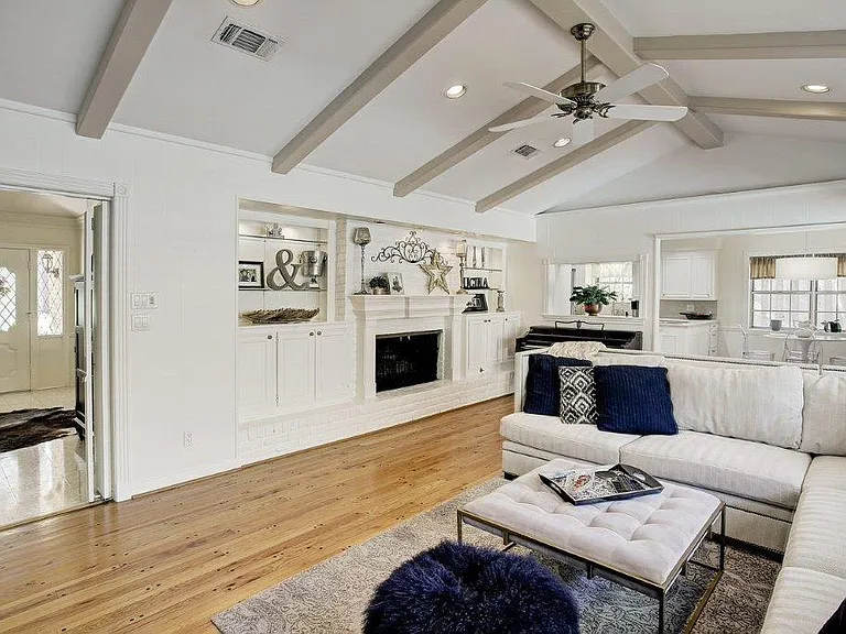 Gas fire place and pass through minibar.