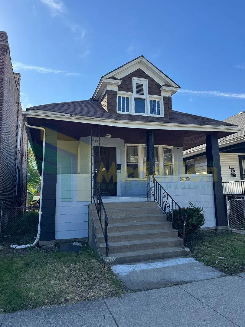 4-Bedroom Home with Original Hardwood Details - near 114th & Michigan Ave — Photo 1