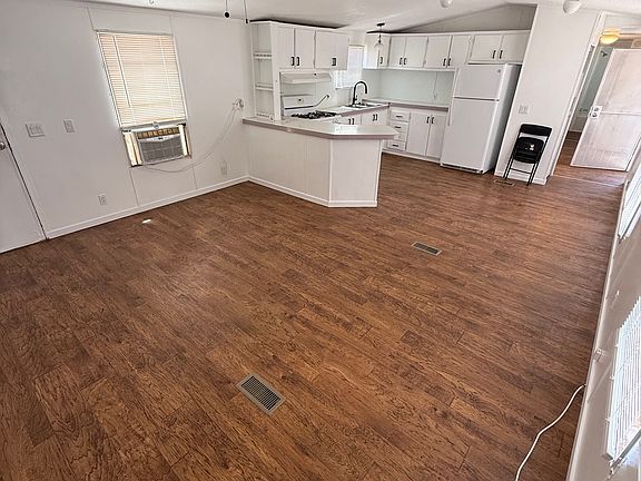 Livingroom facing kitchen