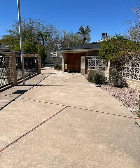 Eastwood Townhomes Large Gated Swimming Pool with Shaded Child Shallow Area, Sun Lounge Area.