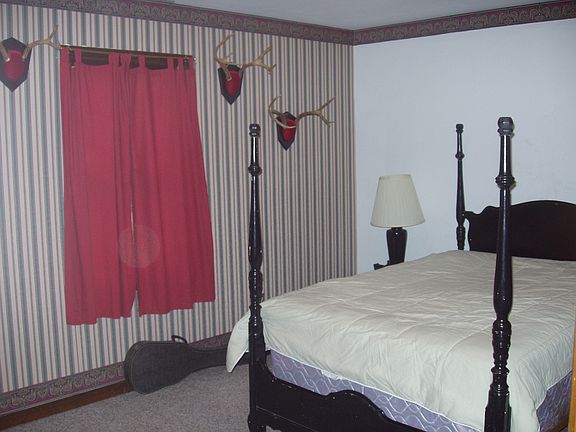 bedroom 1 (note wallpaper has been removed)