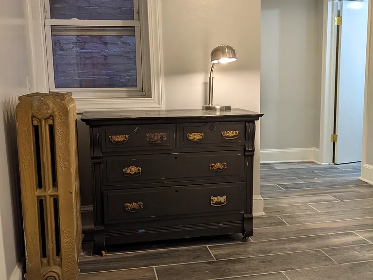 Bedroom from doorway. First large closet is back and to the right.