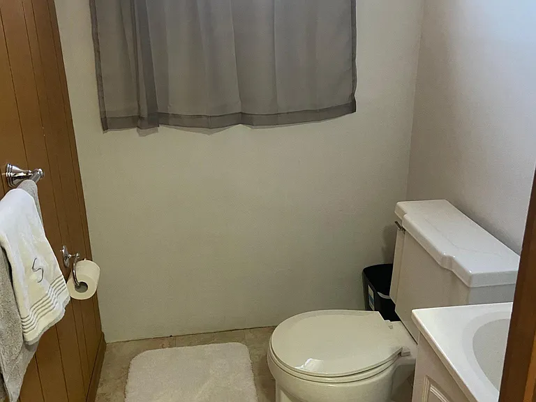 Basement half bathroom (shower outside of this space in the basement as well)