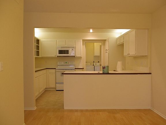 Kitchen with access to laundry and garage