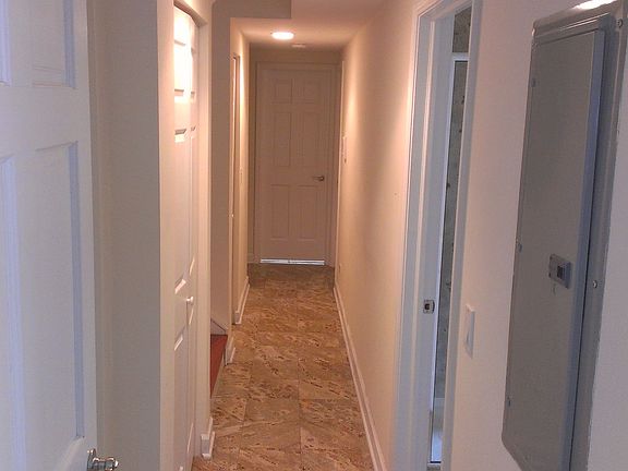 marble flooring throughout hallway