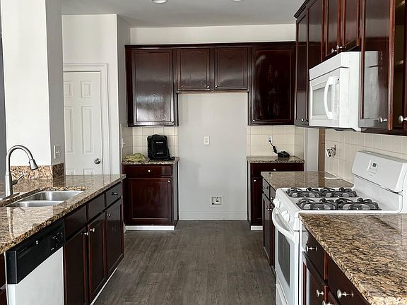 Large kitchen with granite counter tops