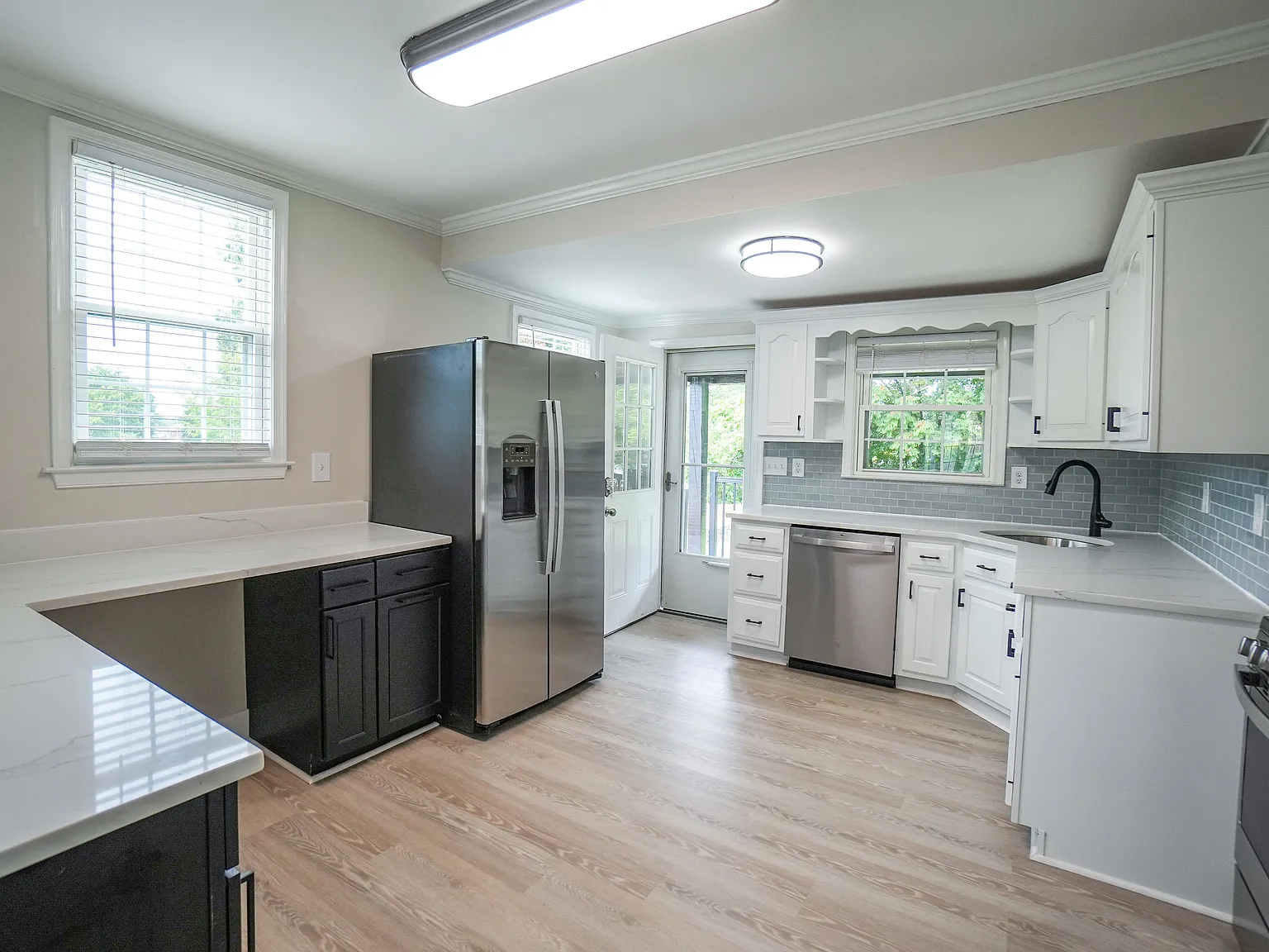 Spaciously Renovated 4BR / 3 Full Bath Home with Large Fenced Yard — Photo 3