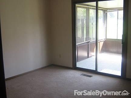 View of 2nd Bedroom
						:
						2nd bedroom has double closets with the sun porch off of the bedroom.