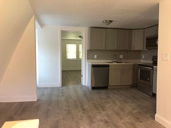 Living room and kitchen area.