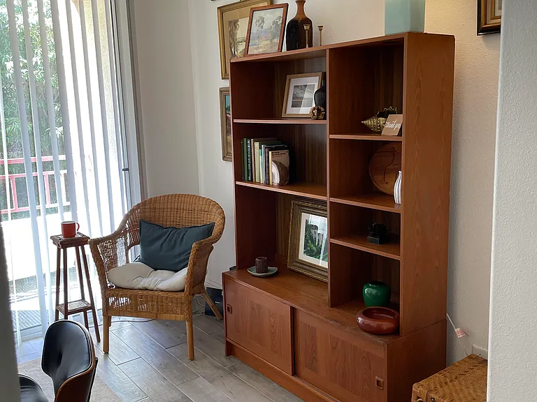 Wall unit added for storage. We are happy to move this to another location in the condo to suit your preference.