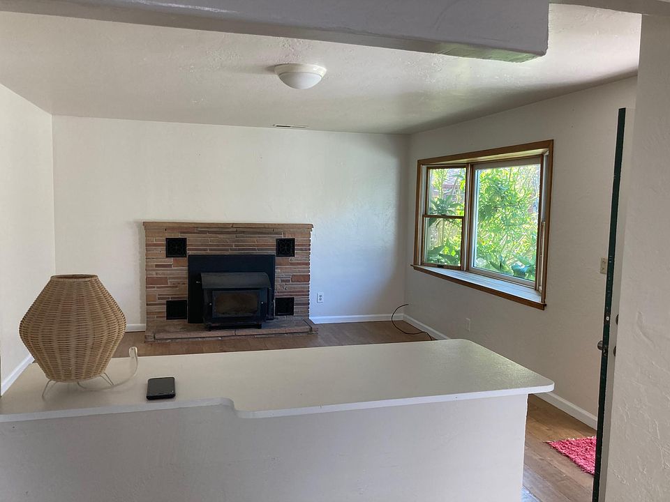 Kitchen bar top looks over living room