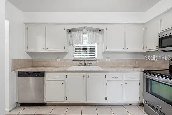 1706 Belleair Forest Dr #136 — Photo 13