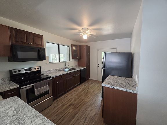Complete kitchen remodel. Dishwasher, microwave, fridge and smooth top range with self cleaning oven.