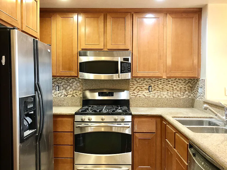 Kitchen with Stainless Steel Appliances and Granite Countert
