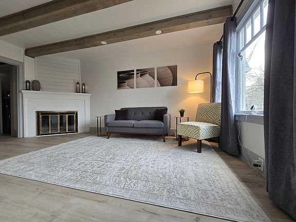 Living Room (wood burning fireplace)