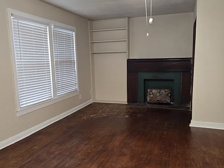 Large master bedroom with fireplace