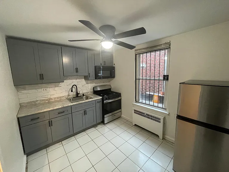 6037 Castor Ave — Photo 5