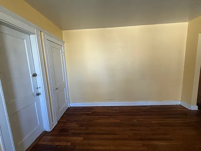 Living Room, EMERG Exit Door and Closet Door. Right side is lobby.
