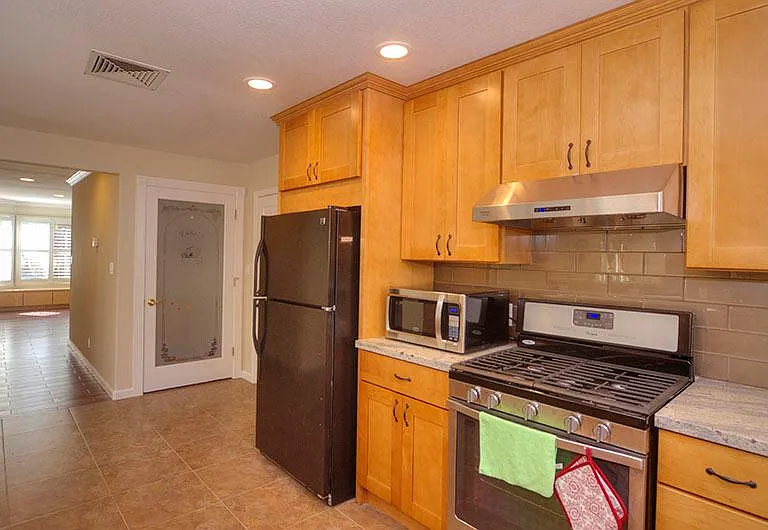Kitchen: Appliances like new, Pantry for storage