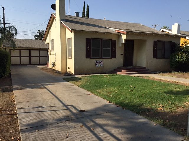 Front of house with driveway