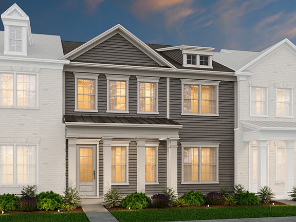 Savannah Exterior 1 features Hardi Board siding, covered front porch and rear 2 car garage