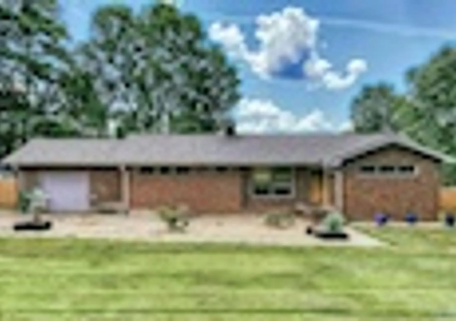 Charming brick rancher on a stunning 3/4-acre lot in Huntsville! **6 month lease only** — Photo 1