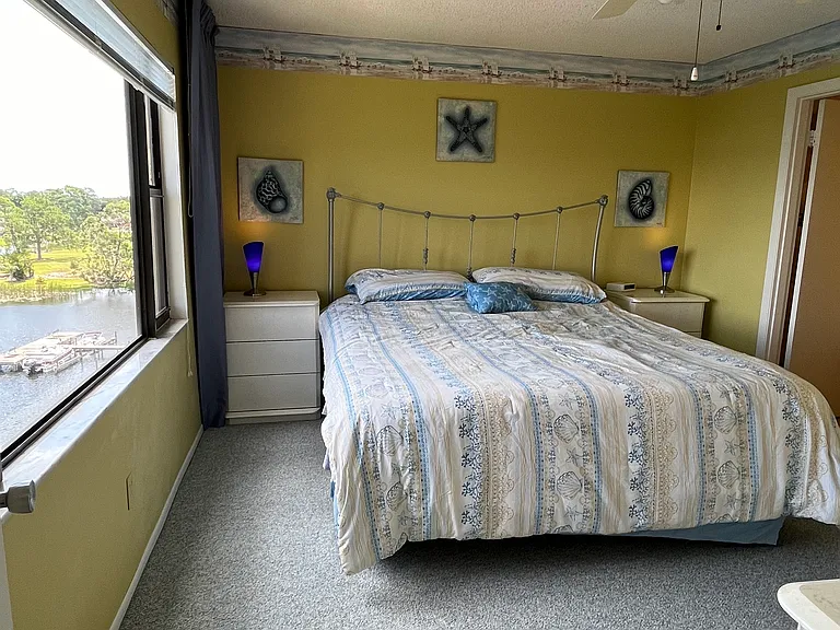 Master bed with king bed, ensuite bath and walk in closet.
