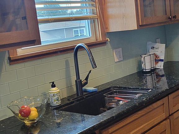 12ft granite counter top with pullout shelves.