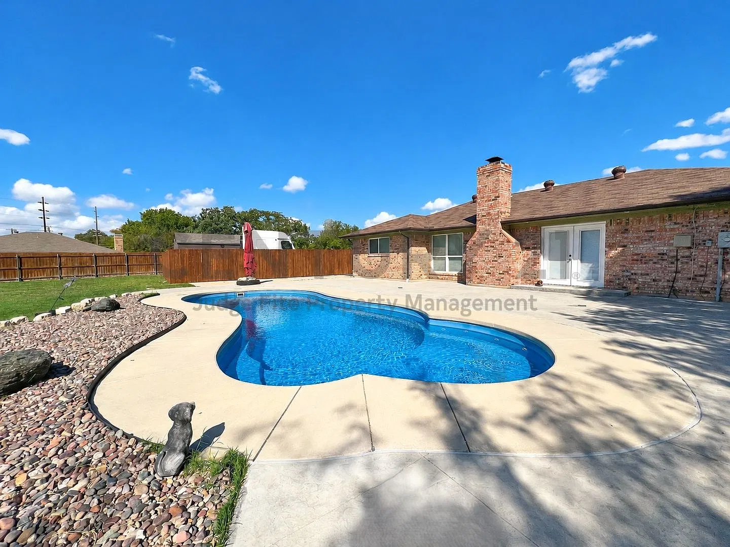 Freshly Painted 4/2/2 Gem with Sparkling In-Ground Pool Nestled in Established Denton Neighborhoo... — Photo 1