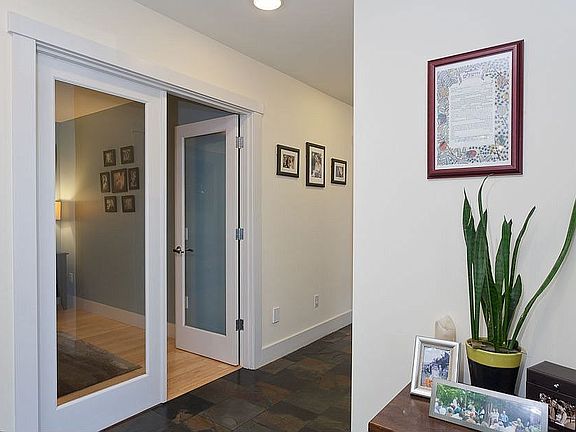 Main Floor Entryway. Notice the glass French Doors 