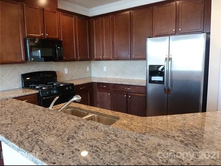 9601 Camberley Ave NW — Photo 10