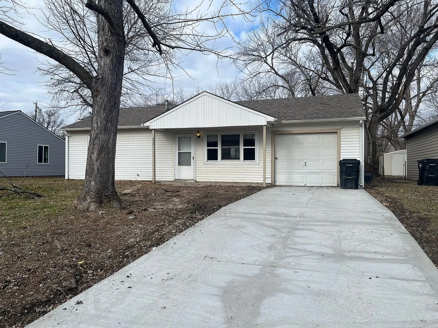 Updated Home With New Windows, Flooring & Driveway — Photo 1