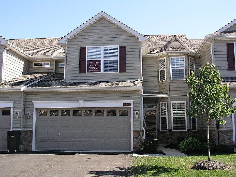 Front with 2 car garage