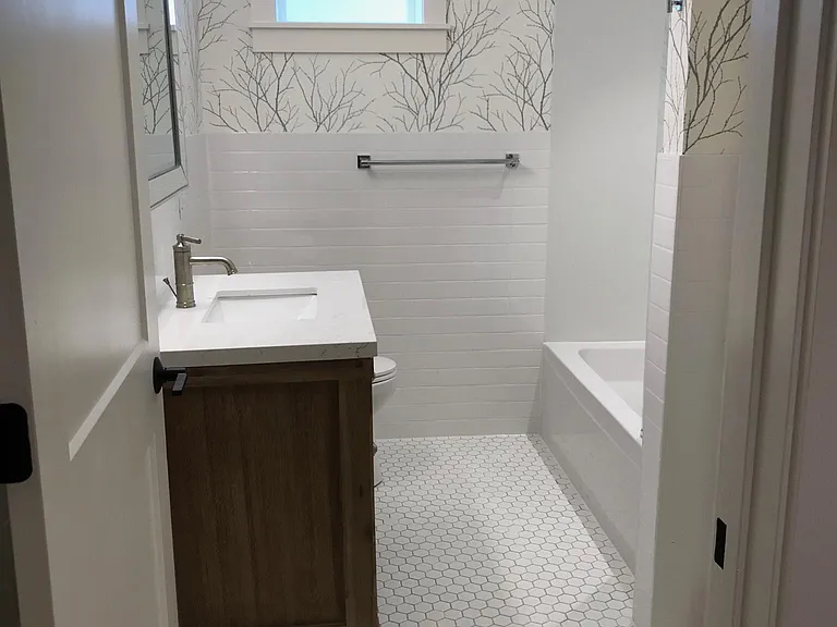 Bathroom with heated floor and linen closet