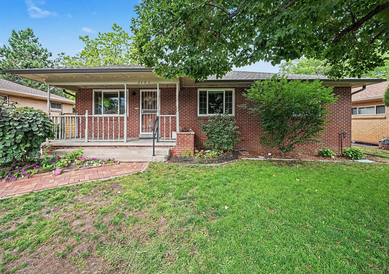 Spacious 4-Bedroom Home with Finished Basement & Secure Backyard — Photo 1