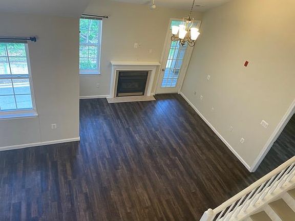 Living Room with fireplace view from Loft