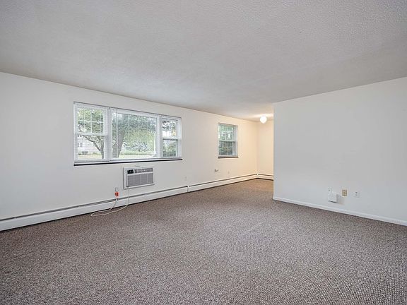 Large living area with separate A/C unit.