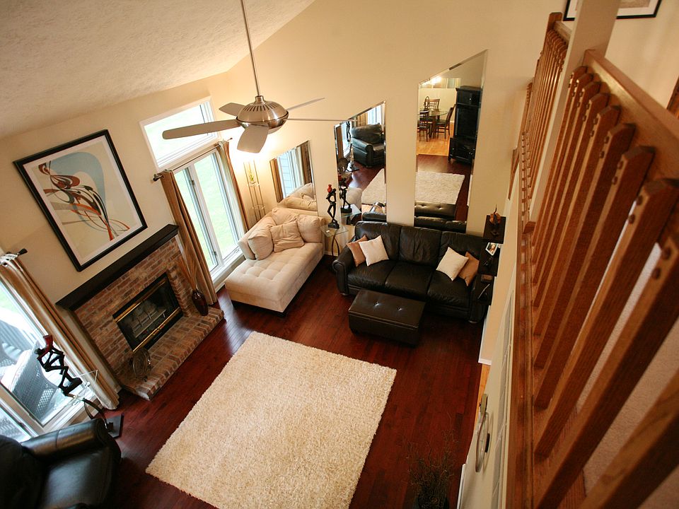 Large open living room with a gas fireplace