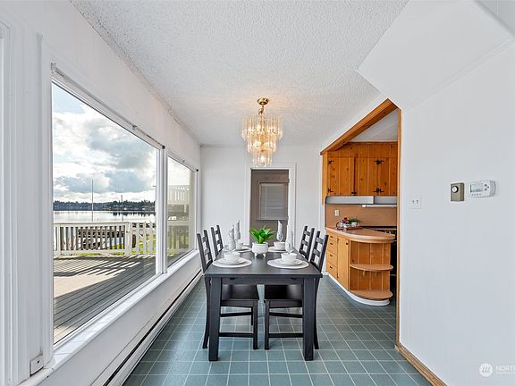 Dining area facing the lake off of the kitchen.>