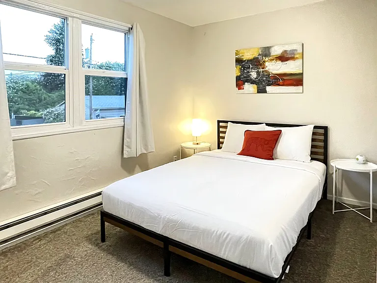 Bedroom 2 (Staged for concept only - unit rents unfurnished)